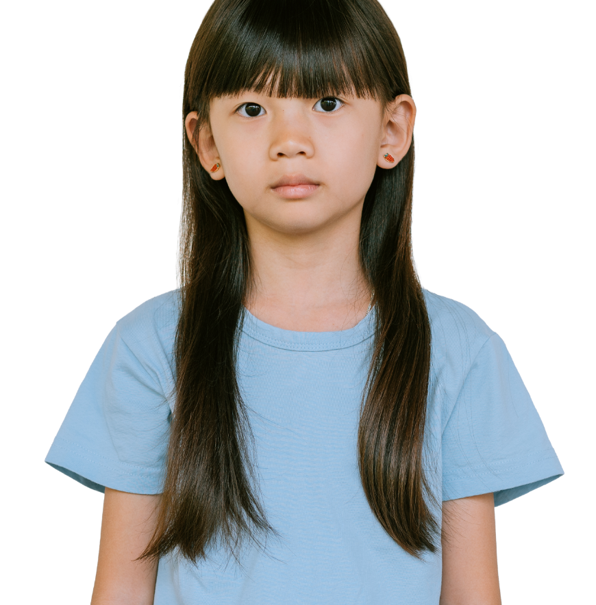 Young asian girl with long brown hair wearing a blue t-shirt